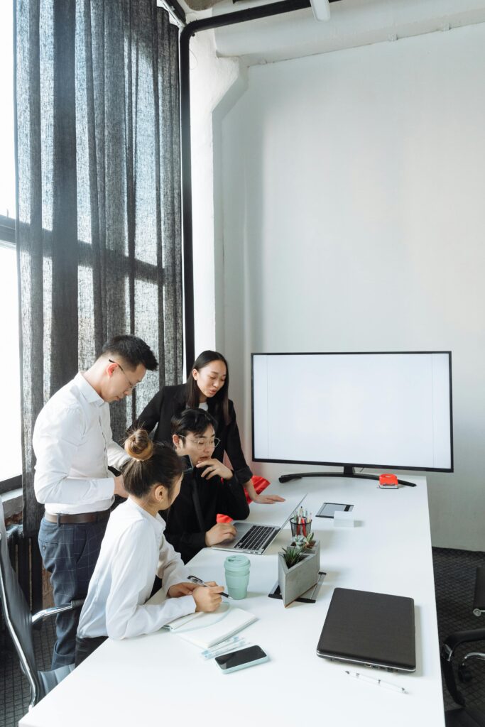 pexels-photo-7652058-7652058 A Group of People Having a Meeting in the Office